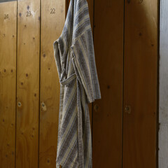 Lapuan Kankurit KAAPELITEHDAS bathrobe long ivory-brown-blue photocredit Bryan Saragosa